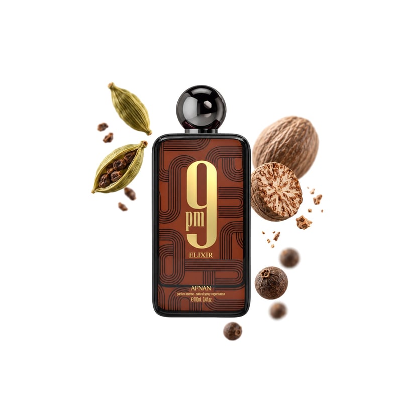 9pm Elixir by Afnan, bottle pictured with its key notes: Cardamom, Nutmeg and Pimento