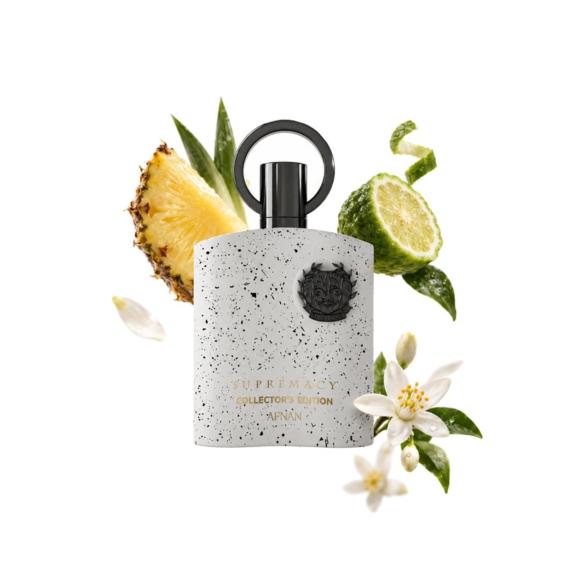 Supremacy Collector's Edition by Afnan, bottle pictured with its key notes: Pineapple, Bergamot and Orange Blossom