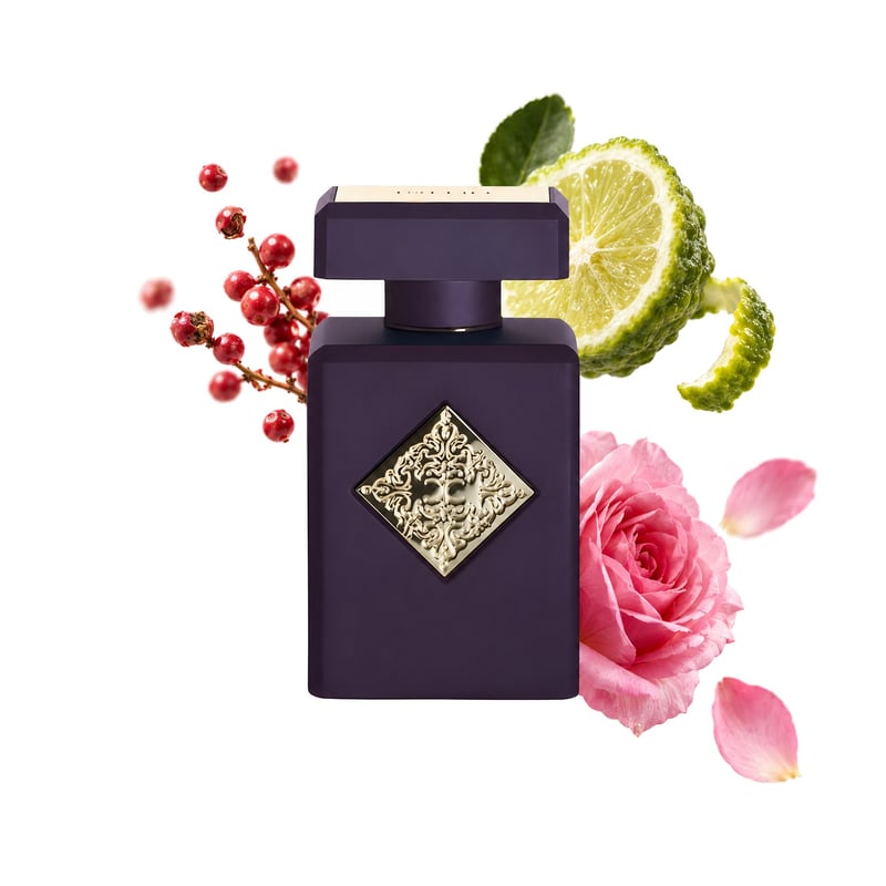 Atomic Rose de Initio Parfums Prives, frasco con sus notas principales: Pimienta rosa, Bergamota y Rosa búlgara