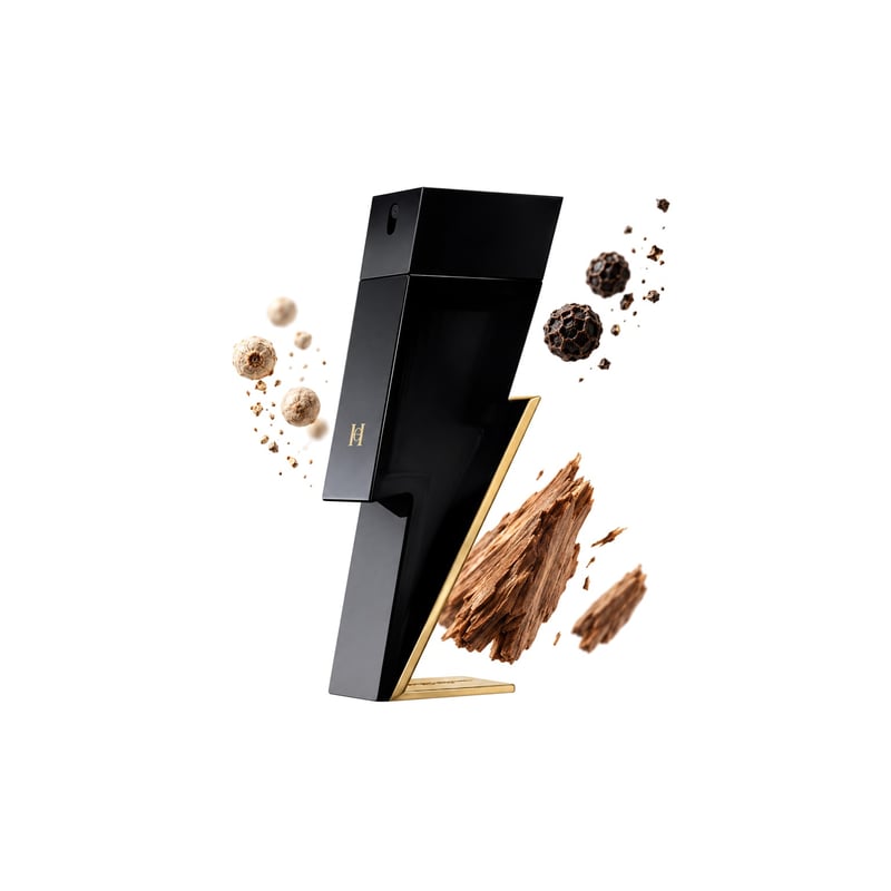 Bad Boy by Carolina Herrera, bottle pictured with its key notes: White Pepper, Black Pepper and Cedarwood