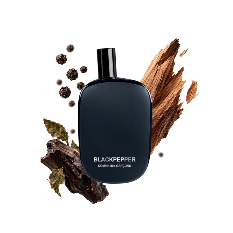 Blackpepper by Comme des Garçons, bottle pictured with its key notes: Black Pepper, Cedar and Akigalawood