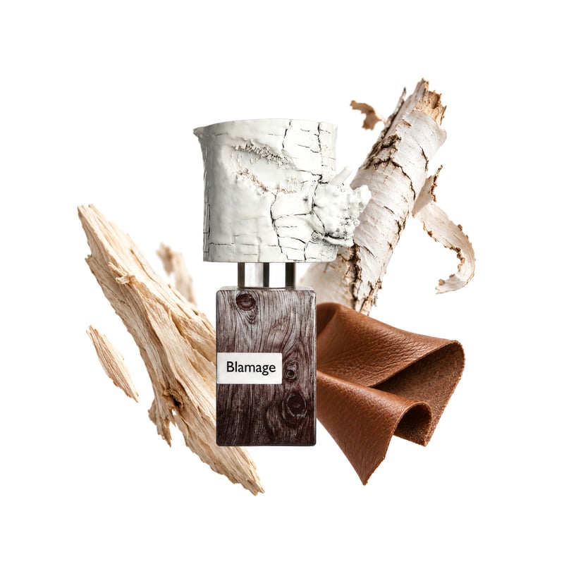 Blamage by Nasomatto, bottle pictured with its key notes: White Wood, Birch and Leather