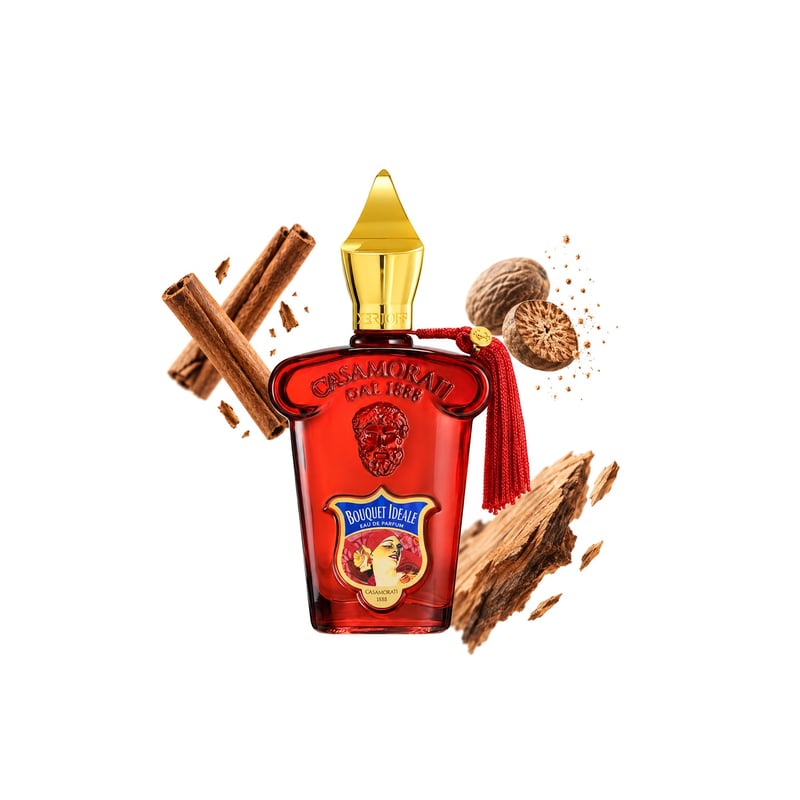 Bouquet Ideale by Xerjoff, bottle pictured with its key notes: Cinnamon, Nutmeg and Virginia Cedar