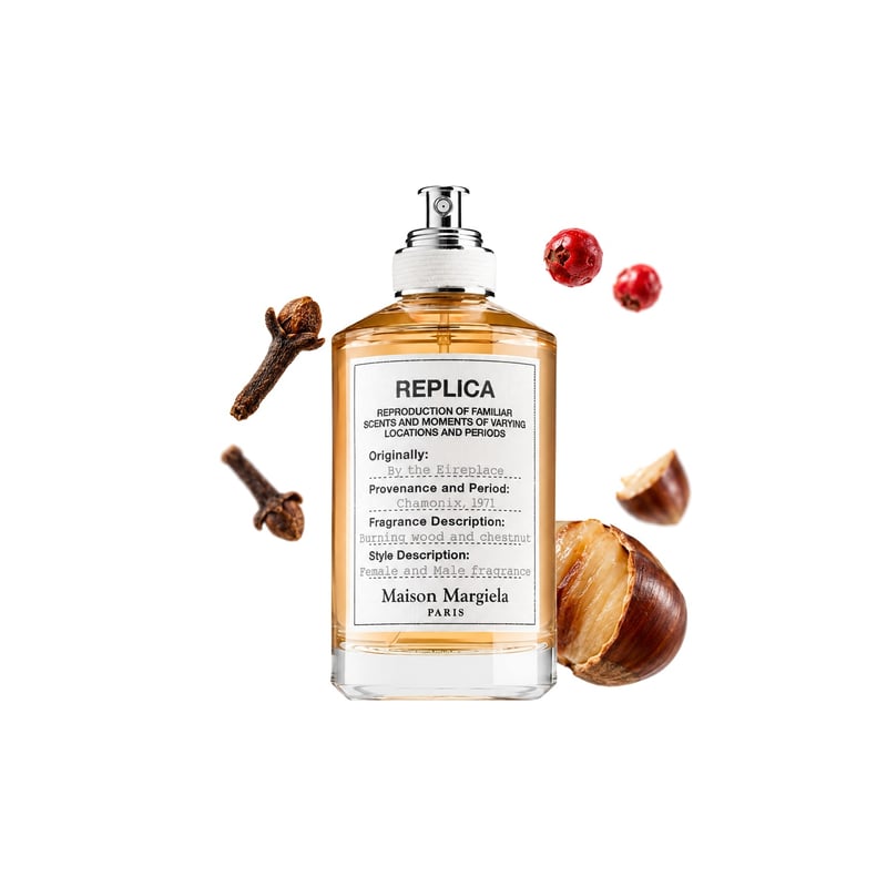 By the Fireplace by Maison Margiela, bottle pictured with its key notes: Cloves, Pink Pepper and Chestnut