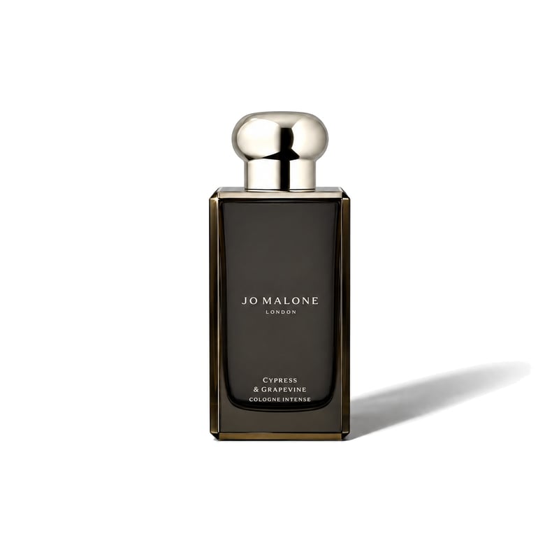 Cypress & Grapevine Cologne Intense by Jo Malone London, bottle casting a soft shadow