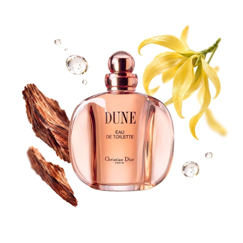 Dune by Dior, bottle pictured with its key notes: Brazilian Rosewood, Aldehydes and Ylang-ylang