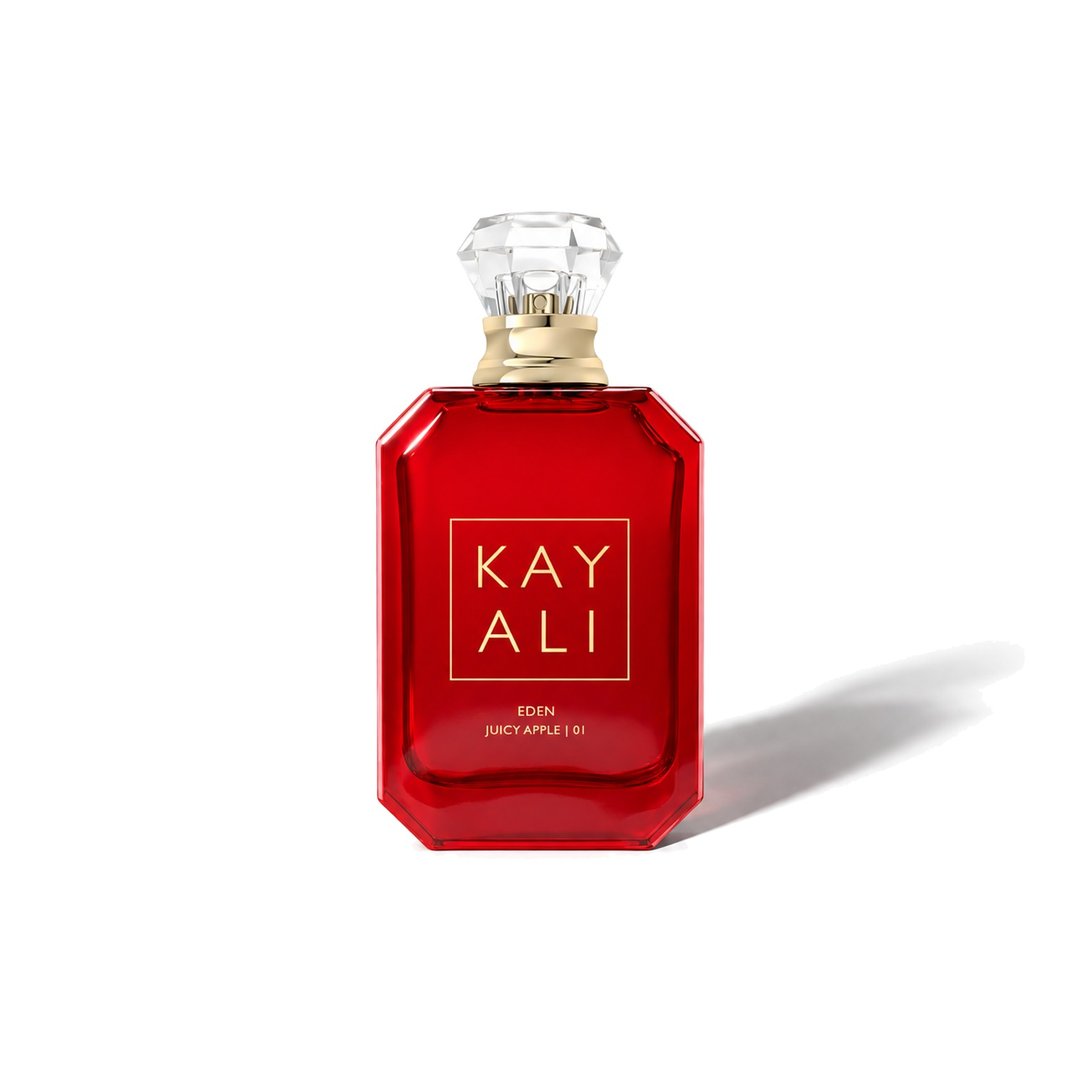 Eden Juicy Apple | 01 by Kayali, bottle casting a soft shadow, photo 1 of 6