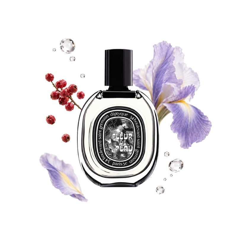 Fleur de Peau by Diptyque, bottle pictured with its key notes: Aldehydes, Pink Pepper and Iris