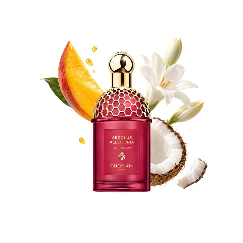 Florabloom Absolu by Guerlain, bottle pictured with its key notes: Mango, Coconut and Tuberose