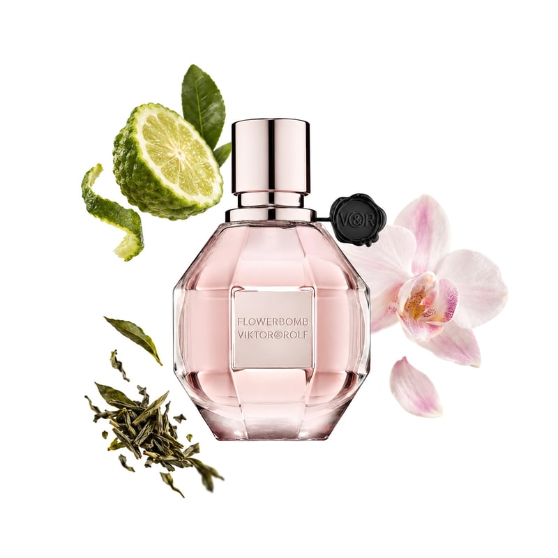 Flowerbomb by Viktor & Rolf, bottle pictured with its key notes: Bergamot, Green Tea and Orchid