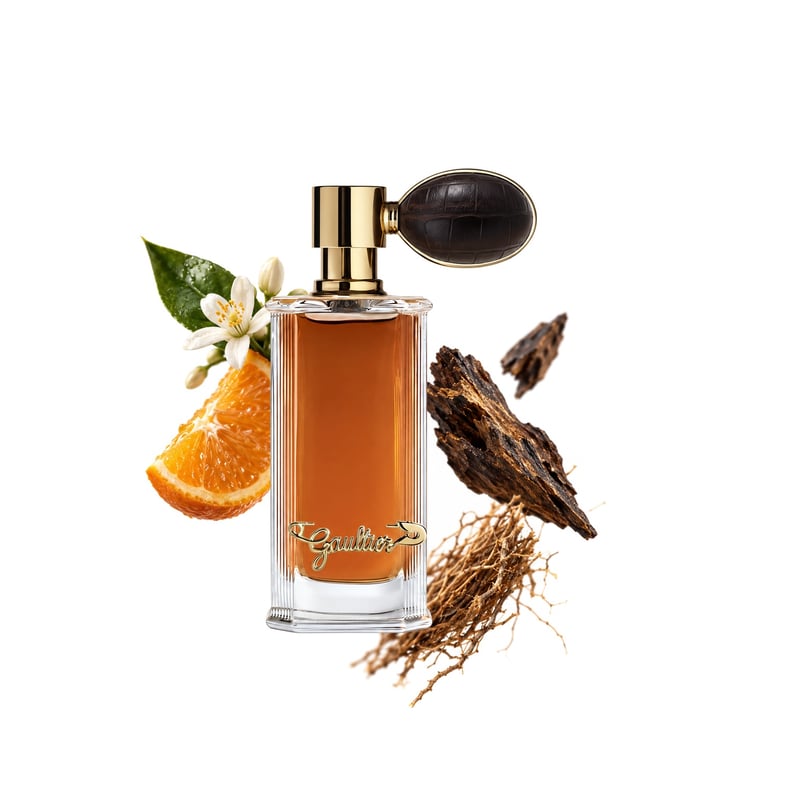 French Oud by Jean Paul Gaultier, bottle pictured with its key notes: Bitter Orange, Oud and Cypriol