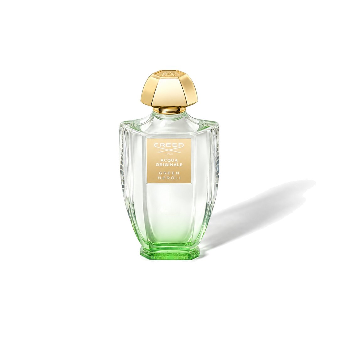 Green Neroli by Creed, bottle casting a soft shadow, photo 1 of 6