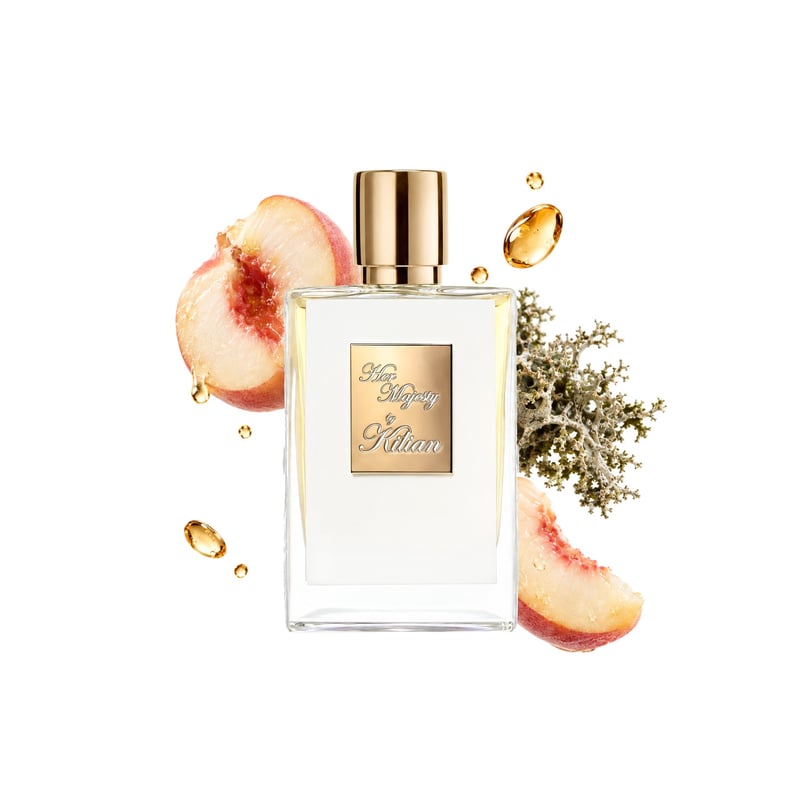 Her Majesty by By Kilian, bottle pictured with its key notes: White Peach, Rum and Oakmoss