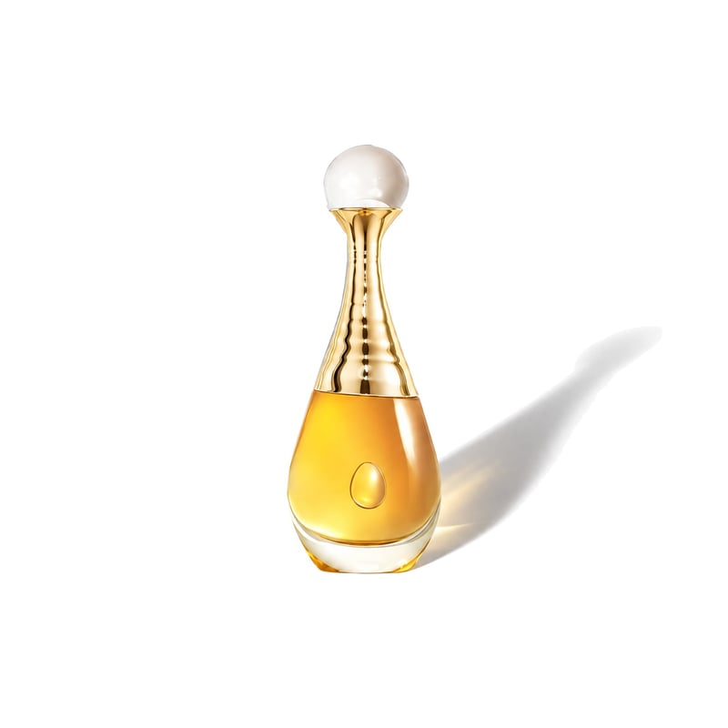 J'adore L'Or (2023) by Dior, bottle casting a soft shadow