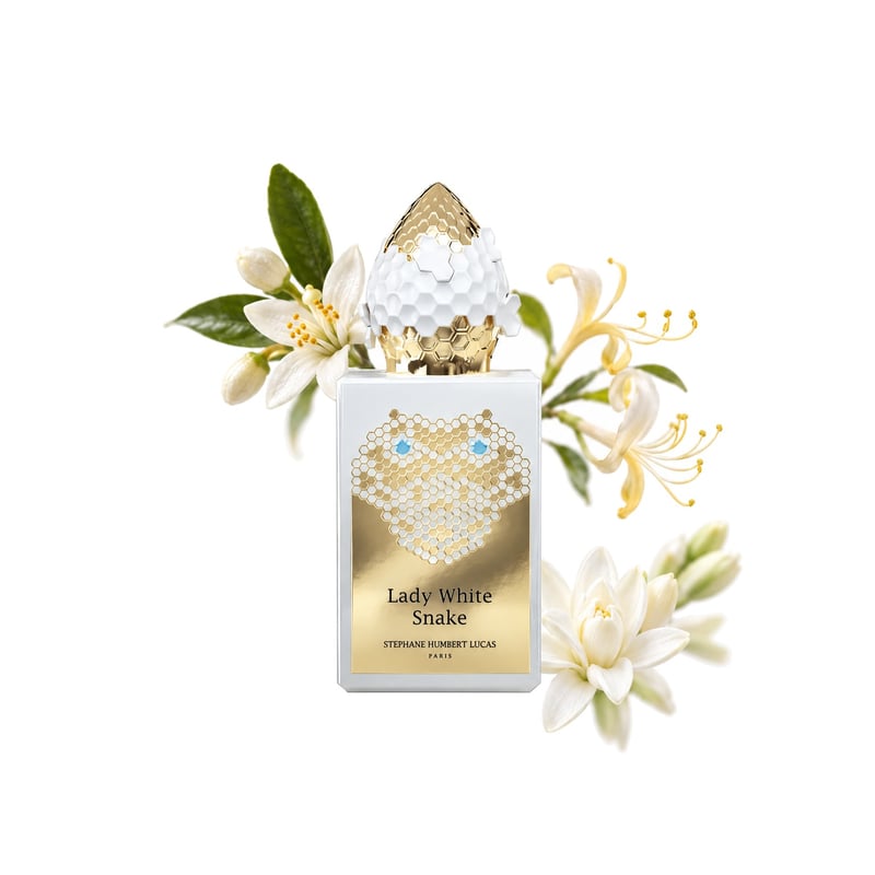 Lady White Snake by Stéphane Humbert Lucas 777, bottle pictured with its key notes: Orange Blossom, Honeysuckle and Tuberose