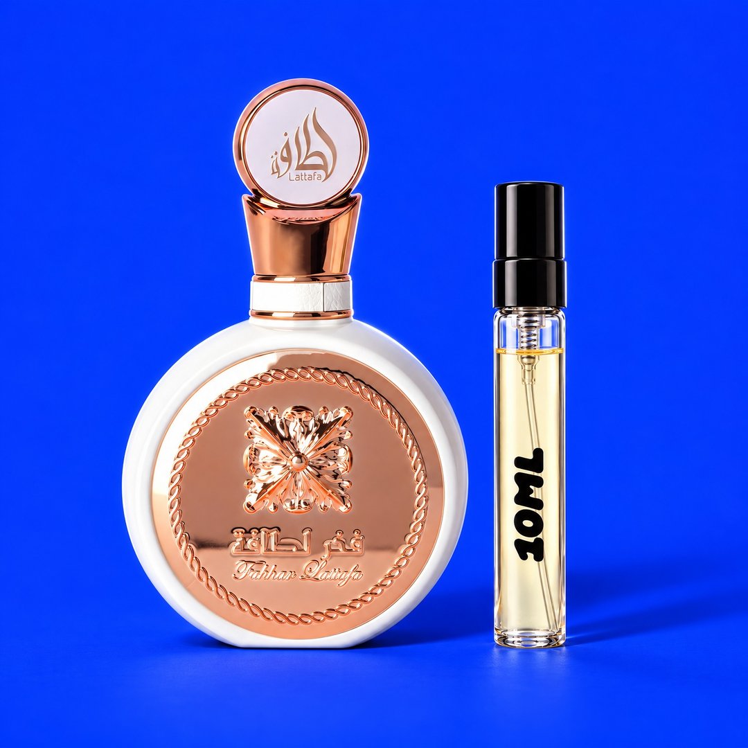 10 ml decant of Fakhar Rose by Lattafa next to the original bottle