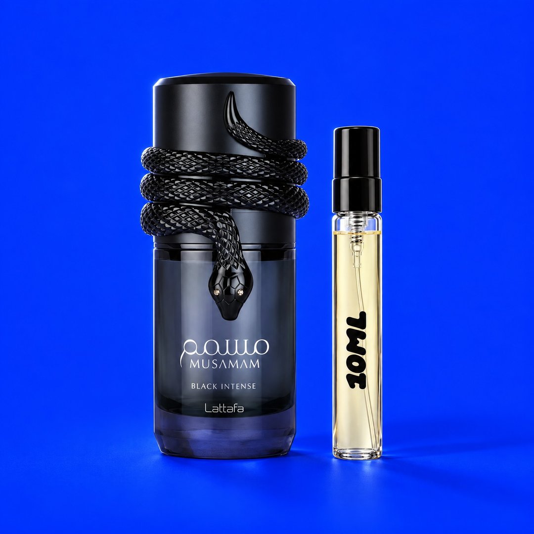 10 ml decant of Musamam Black Intense by Lattafa next to the original bottle