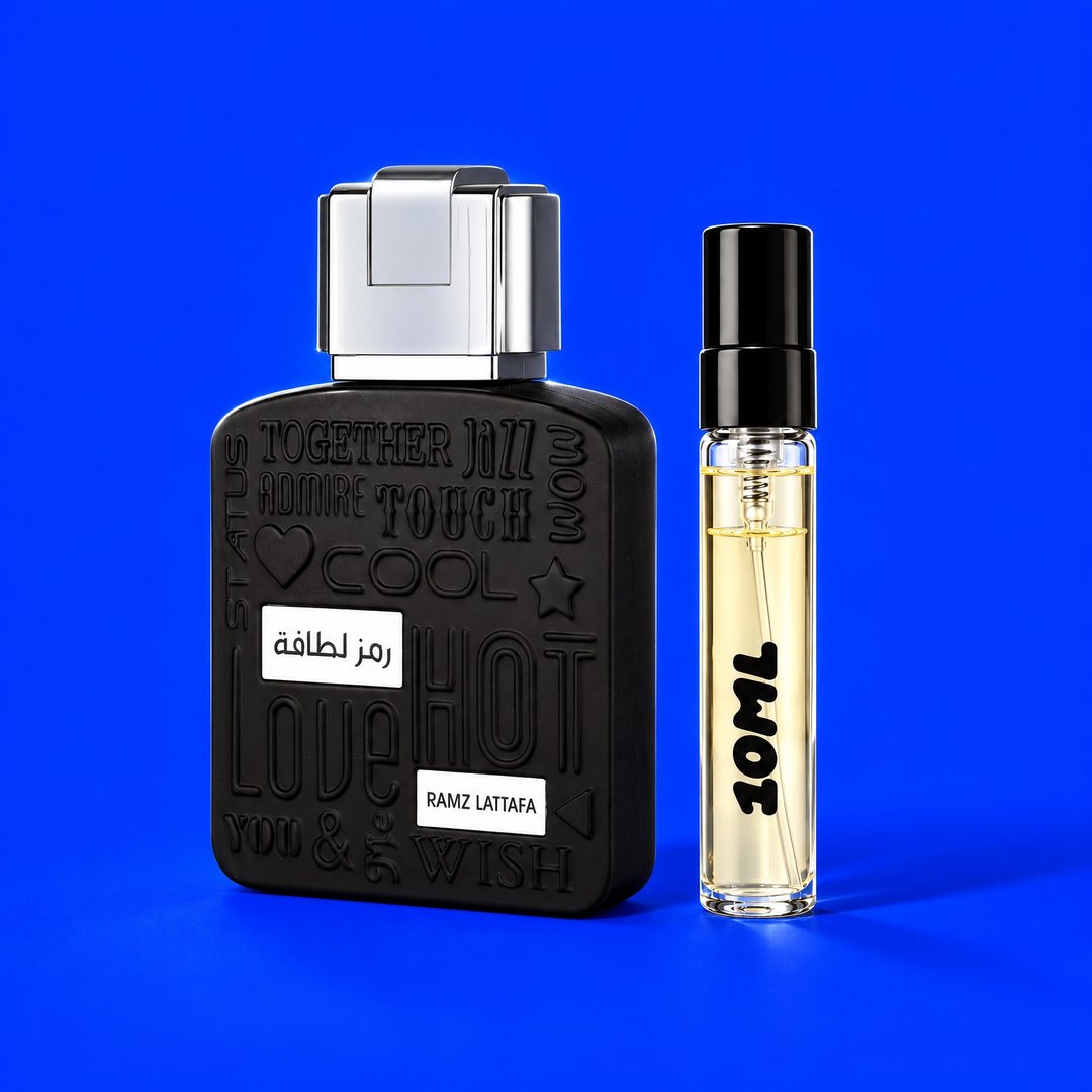 10 ml decant of Ramz Silver by Lattafa next to the original bottle