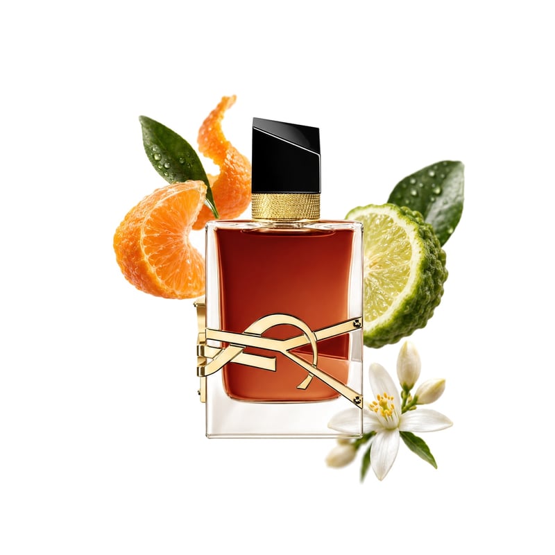 Libre Le Parfum by Yves Saint Laurent, bottle pictured with its key notes: Mandarin Orange, Bergamot and Orange Blossom