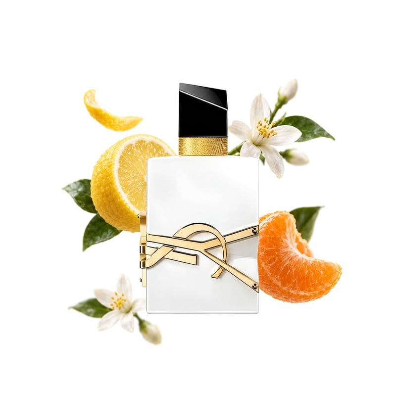 Libre L’Eau Nue d’Yves Saint Laurent, flacon entouré de ses notes clés : Citron, Mandarine et Fleur d’oranger