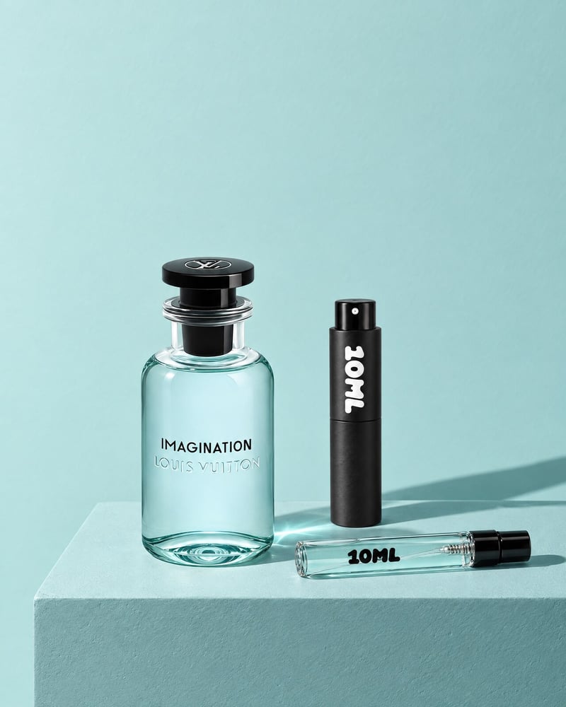 Louis Vuitton Imagination with a 10ML travel atomiser and a 10ML refill vial on a blue plinth