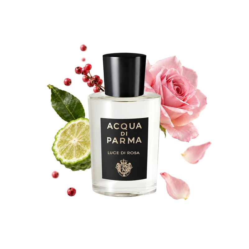 Luce di Rosa by Acqua di Parma, bottle pictured with its key notes: Pink Pepper, Bergamot and Rose
