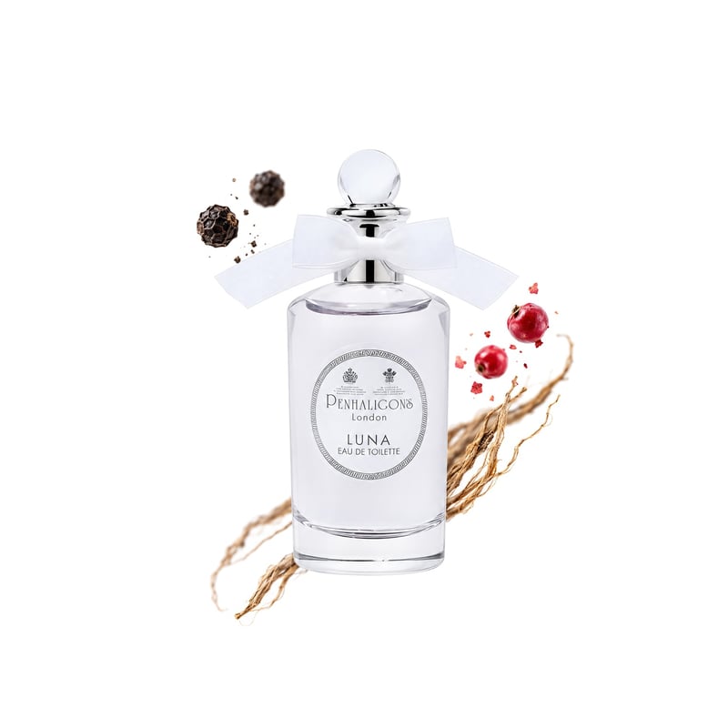 Luna by Penhaligon's, bottle pictured with its key notes: Black Pepper, Pink Pepper and Haitian Vetiver