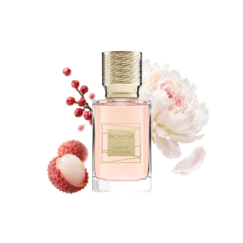 Lust in Paradise by Ex Nihilo, bottle pictured with its key notes: Pink Pepper, White Peony and Lychee