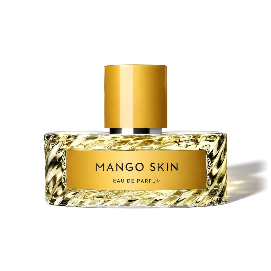 Mango Skin de Vilhelm Parfumerie, frasco que proyecta una sombra suave, foto 1 de 6