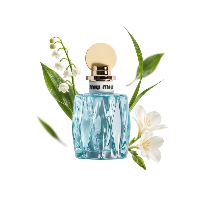 L'Eau Bleue di Miu Miu, flacone con le sue note principali: Mughetto, Note verdi e Fiori bianchi