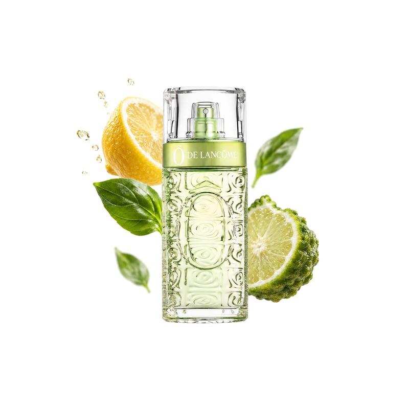 Ô de Lancôme by Lancôme, bottle pictured with its key notes: Lemon, Bergamot and Basil