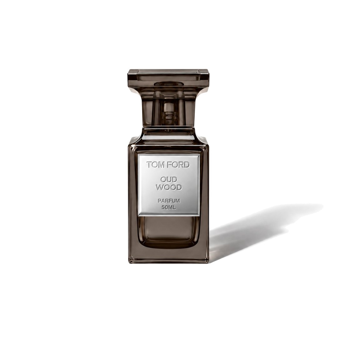 Oud Wood Parfum by Tom Ford, bottle casting a soft shadow, photo 1 of 6