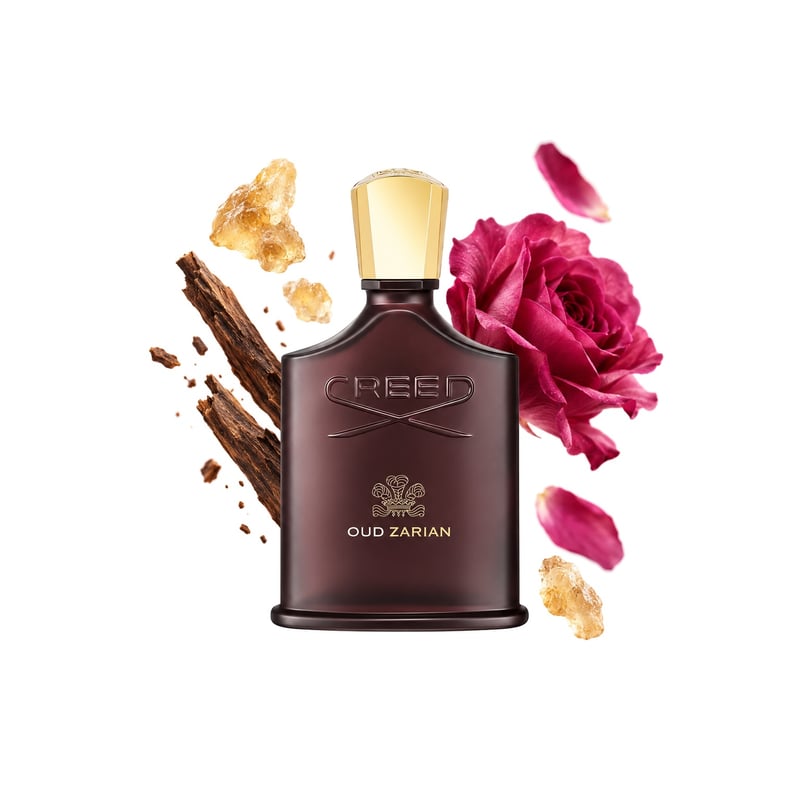 Oud Zarian by Creed, bottle pictured with its key notes: Spices, Frankincense and May Rose