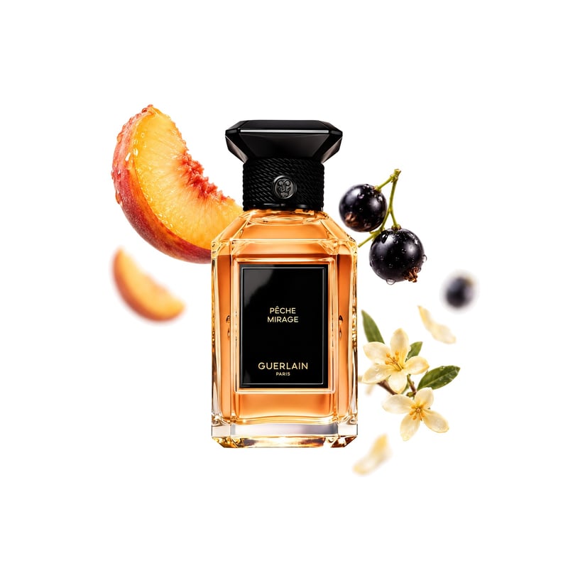 Pêche Mirage by Guerlain, bottle pictured with its key notes: Peach, Blackcurrant and Osmanthus