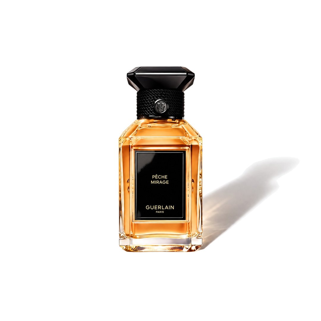 Pêche Mirage by Guerlain, bottle casting a soft shadow, photo 1 of 6