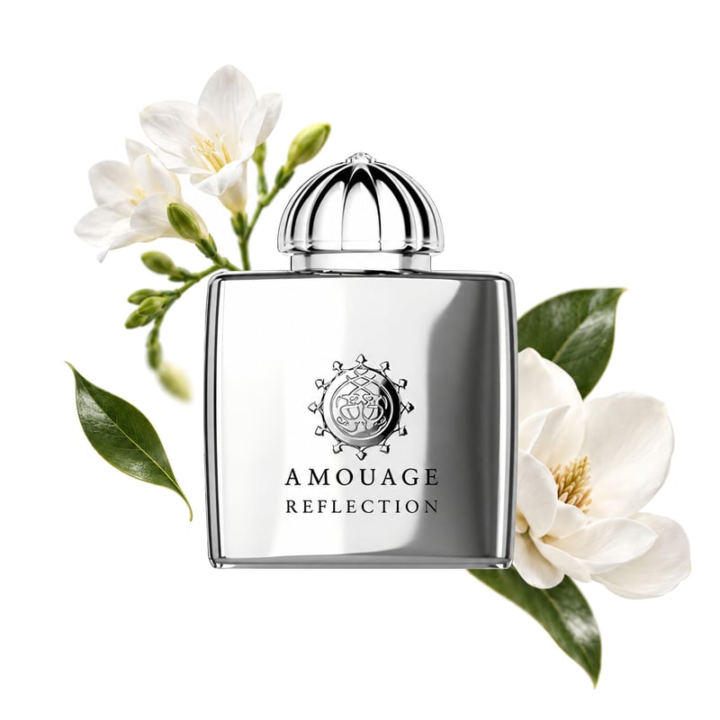 Reflection Woman by Amouage, bottle pictured with its key notes: Green Leaves, Freesia and Magnolia