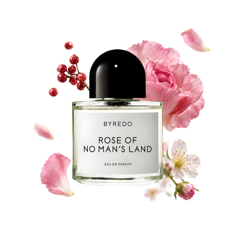 Rose of No Man's Land by Byredo, bottle pictured with its key notes: Pink Pepper, Turkish Rose Petals and Raspberry Blossom