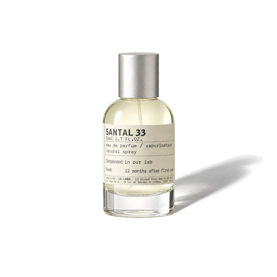 Santal 33 by Le Labo, bottle casting a soft shadow, photo 1 of 6