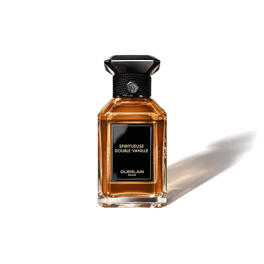 Spiritueuse Double Vanille by Guerlain, bottle casting a soft shadow, photo 1 of 6