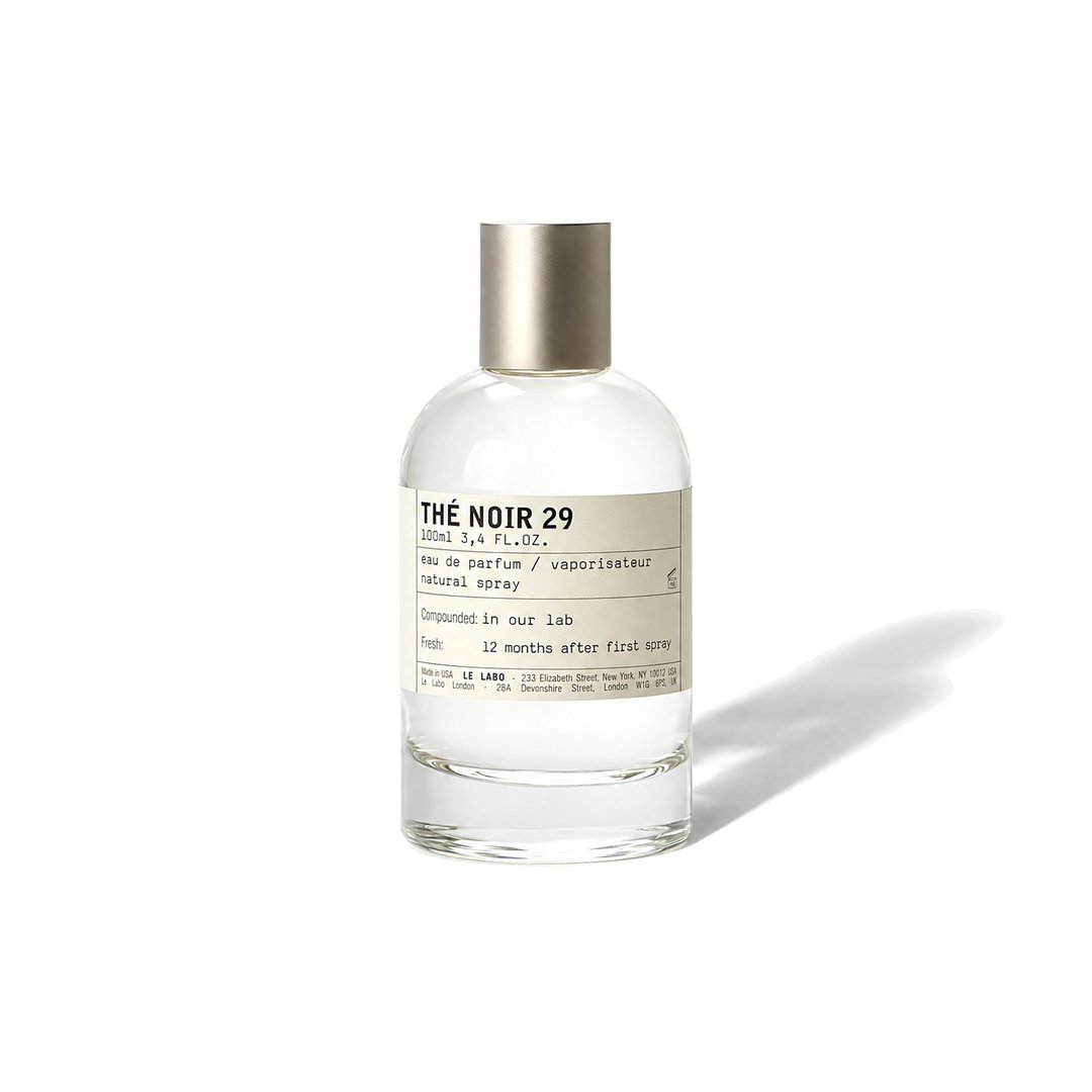 Thé Noir 29 by Le Labo, bottle casting a soft shadow, photo 1 of 6