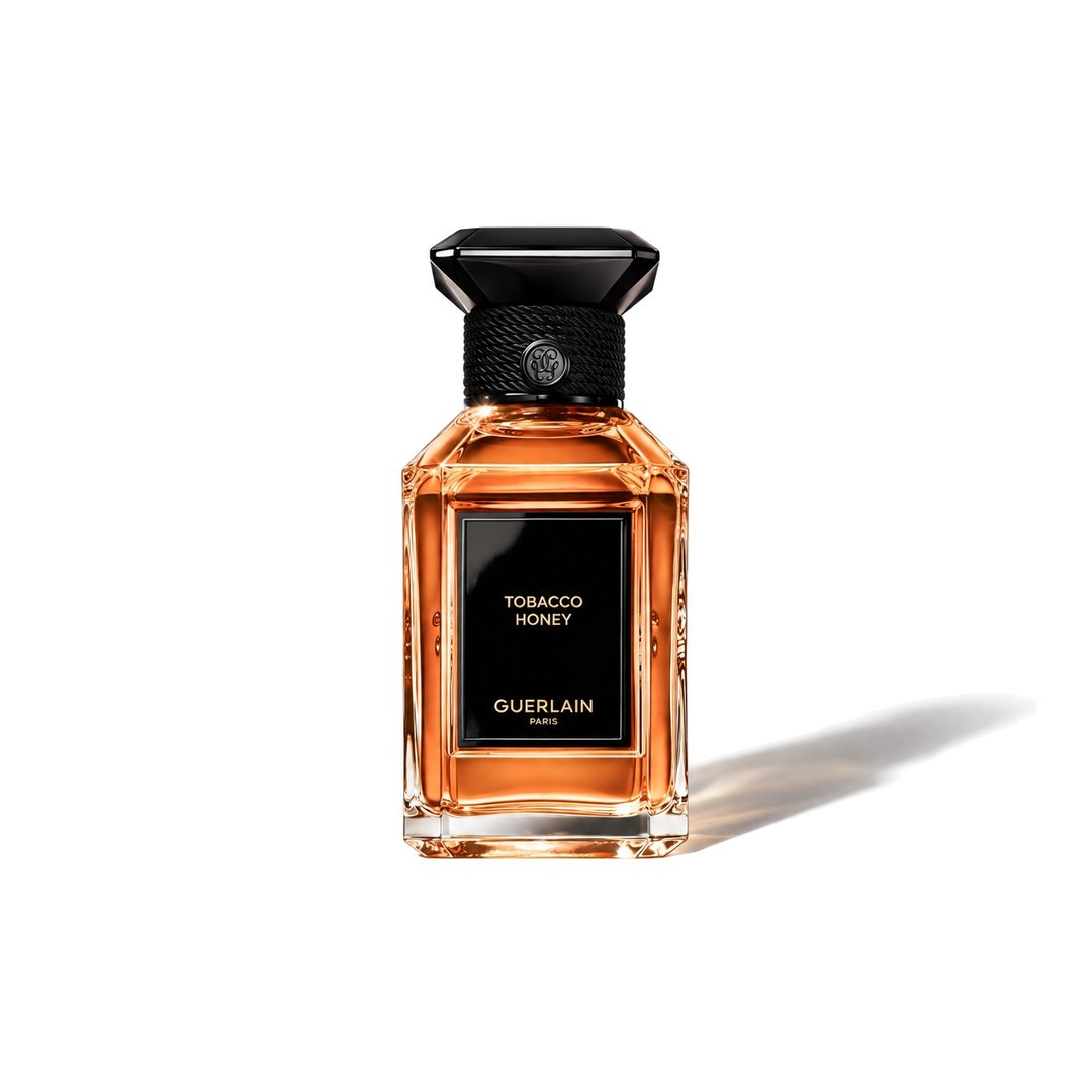 Tobacco Honey by Guerlain, bottle casting a soft shadow, photo 1 of 6