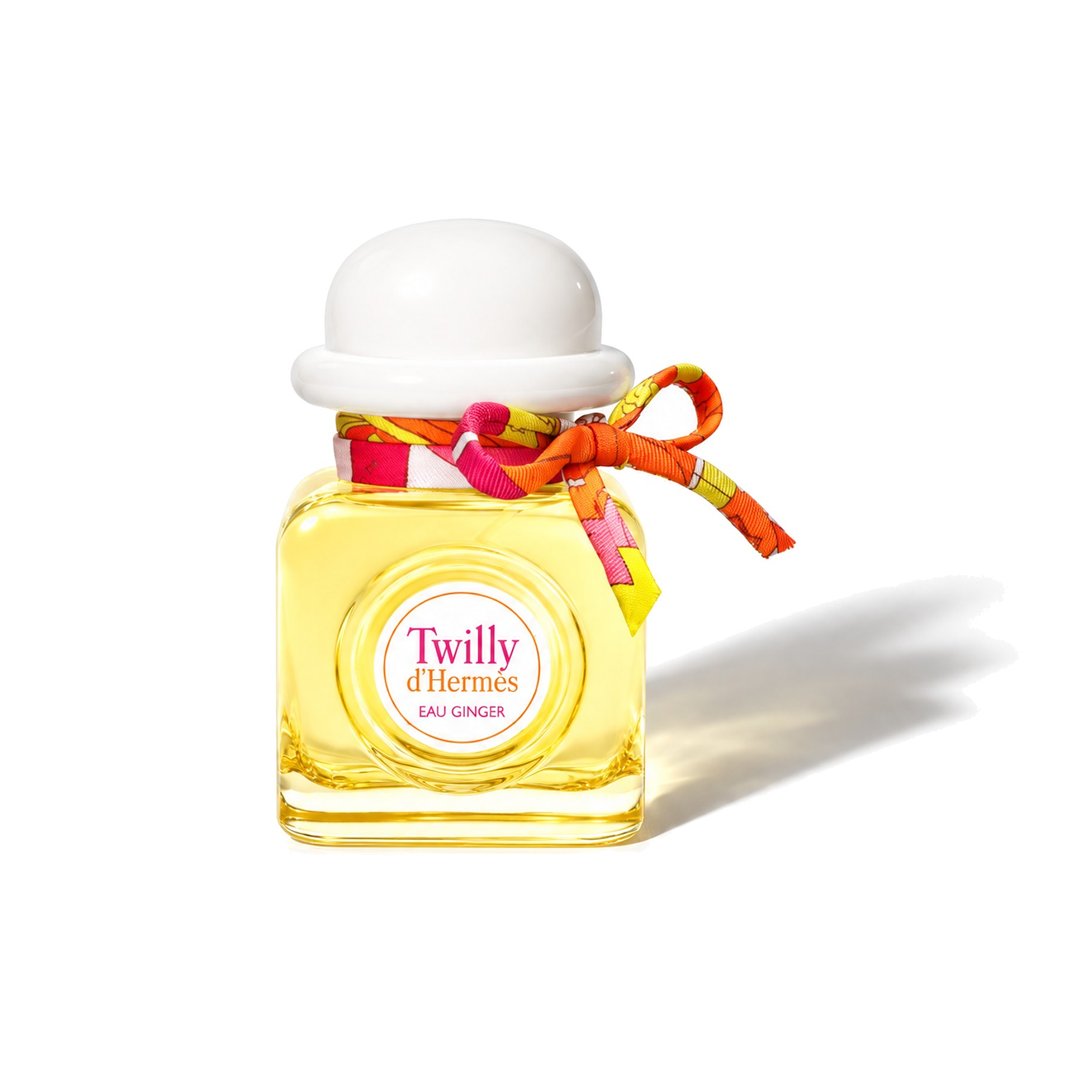 Twilly d'Hermès Eau Ginger by Hermès, bottle casting a soft shadow, photo 1 of 6