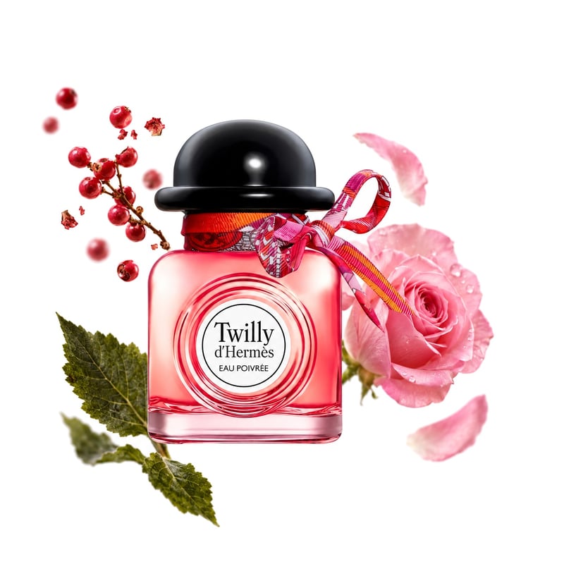 Twilly d'Hermès Eau Poivrée Eau de Parfum by Hermès, bottle pictured with its key notes: Pink Pepper, Rose and Patchouli