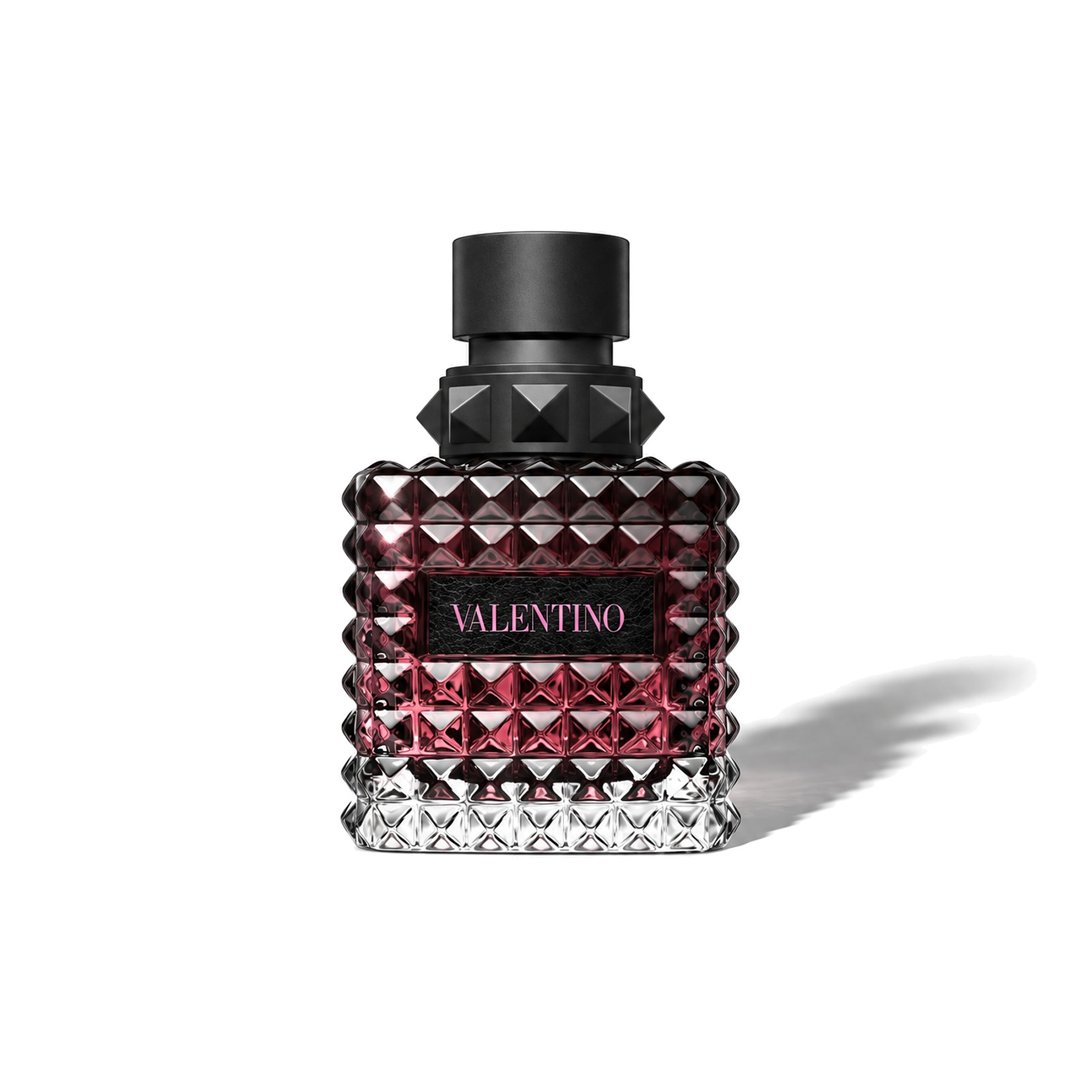 Valentino Donna Born In Roma Intense by Valentino, bottle casting a soft shadow, photo 1 of 6
