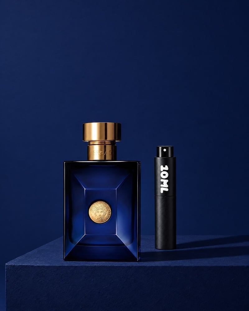 Versace Pour Homme Dylan Blue beside a 10ML travel atomiser on a blue plinth