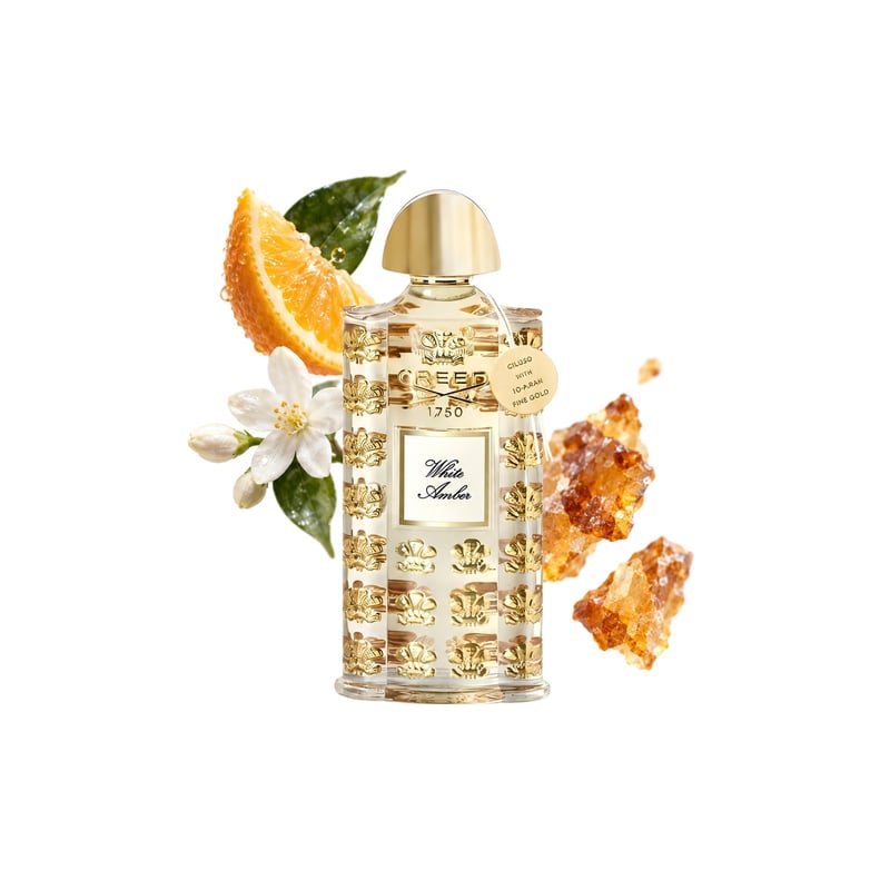 White Amber by Creed, bottle pictured with its key notes: Fruits, Jasmine and Benzoin