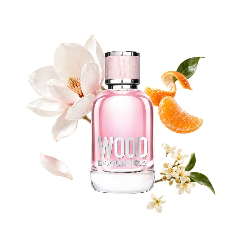 Wood for Her by DSQUARED², bottle pictured with its key notes: Magnolia, Mandarin Orange and Osmanthus
